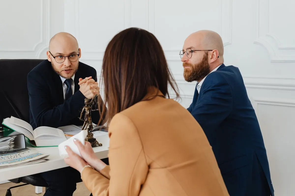Lawyer talking with a client in an office
