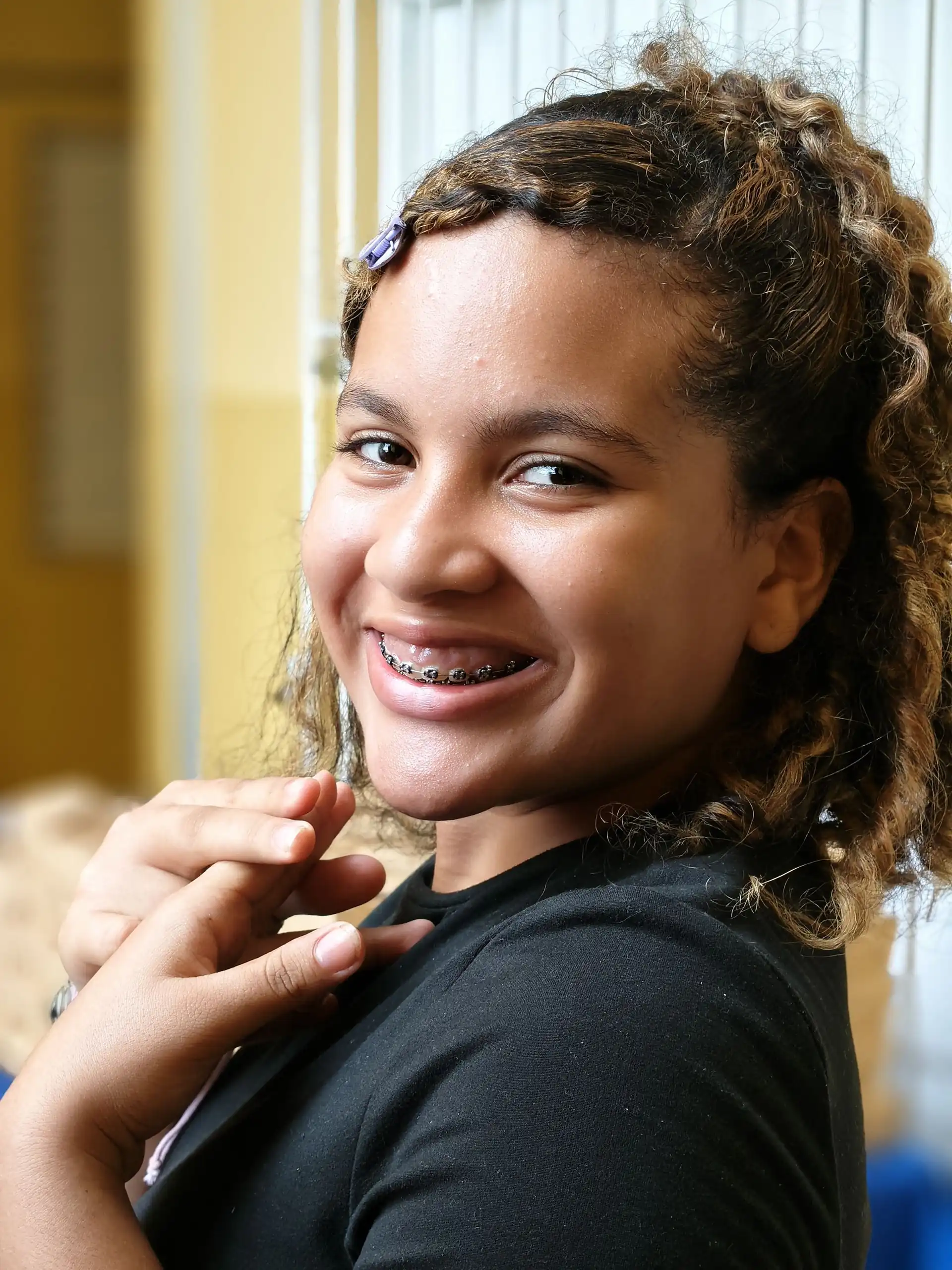 Smiling teen with braces